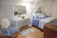 Lorantina Luxury Sea View Holiday House close to Barbati &amp; Ipsos Beach with Starlink WiFi客房内的一张或多张床位