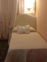 Boutique Hotel Puccini客房内的一张或多张床位