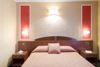 Boutique Hotel Puccini客房内的一张或多张床位