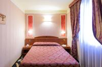 Boutique Hotel Puccini客房内的一张或多张床位