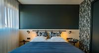 Live Hotels Bordeaux Lac客房内的一张或多张床位