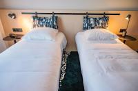 Live Hotels Bordeaux Lac客房内的一张或多张床位