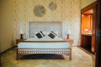 New Sunari Lovina Beach Resort客房内的一张或多张床位