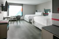 Avid Hotels - Roseville - Minneapolis North by IHG客房内的一张或多张床位