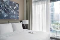 Jumeirah Living Marina Gate Dubai客房内的一张或多张床位