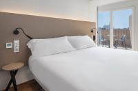 B&B HOTEL Tarragona Centro Urbis客房内的一张或多张床位
