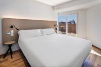 B&B HOTEL Tarragona Centro Urbis客房内的一张或多张床位