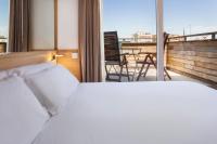 B&B HOTEL Tarragona Centro Urbis客房内的一张或多张床位