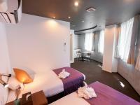Hotel S-Presso Central客房内的一张或多张床位