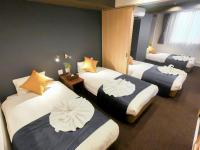 Hotel S-Presso Central客房内的一张或多张床位
