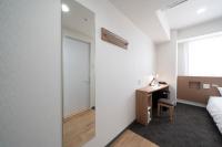 Washington R&B Hotel Nagoya Ekimae客房内的一张或多张床位
