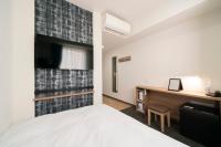 Washington R&B Hotel Nagoya Ekimae客房内的一张或多张床位
