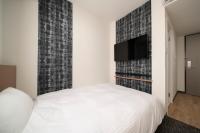 Washington R&B Hotel Nagoya Ekimae客房内的一张或多张床位