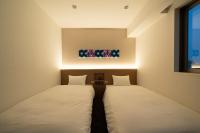 Washington R&B Hotel Nagoya Ekimae客房内的一张或多张床位