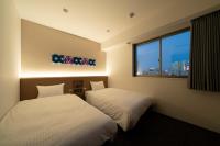 Washington R&B Hotel Nagoya Ekimae客房内的一张或多张床位