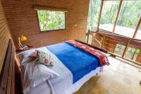 Oca Paraty Chalé Ecológico客房内的一张或多张床位