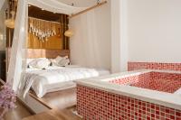 Aishe Honeymoon Erhai Lake Sea View Guesthouse客房内的一张或多张床位