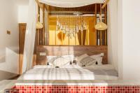 Aishe Honeymoon Erhai Lake Sea View Guesthouse客房内的一张或多张床位