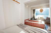 Aishe Honeymoon Erhai Lake Sea View Guesthouse客房内的一张或多张床位