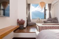 Aishe Honeymoon Erhai Lake Sea View Guesthouse客房内的一张或多张床位