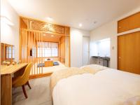 Tanakaya Kyoto Karasuma客房内的一张或多张床位