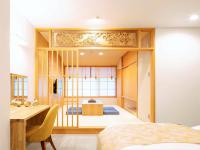 Tanakaya Kyoto Karasuma客房内的一张或多张床位