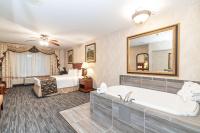 Bellissimo Hotel, Trademark by Wyndham Near Foxwoods Casino客房内的一张或多张床位