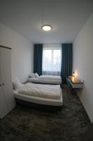 Stary Koszalin Hostel &amp; Hotel Services客房内的一张或多张床位