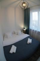 Stary Koszalin Hostel &amp; Hotel Services客房内的一张或多张床位