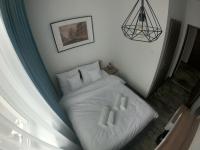 Stary Koszalin Hostel &amp; Hotel Services客房内的一张或多张床位