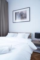 Stary Koszalin Hostel &amp; Hotel Services客房内的一张或多张床位