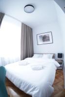 Stary Koszalin Hostel &amp; Hotel Services客房内的一张或多张床位