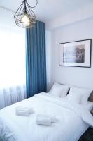 Stary Koszalin Hostel &amp; Hotel Services客房内的一张或多张床位