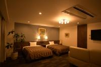 Sakura Shimanami Hotel客房内的一张或多张床位