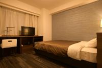 Sakura Shimanami Hotel客房内的一张或多张床位