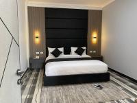 ECCO Modern Guest House客房内的一张或多张床位