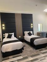 ECCO Modern Guest House客房内的一张或多张床位