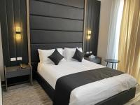 ECCO Modern Guest House客房内的一张或多张床位