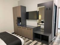 ECCO Modern Guest House客房内的一张或多张床位