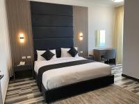 ECCO Modern Guest House客房内的一张或多张床位
