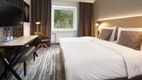 OREA Resort Horizont Šumava客房内的一张或多张床位
