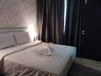SRITEL BOUTIQUE HOTEL客房内的一张或多张床位