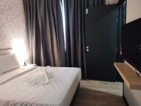 SRITEL BOUTIQUE HOTEL客房内的一张或多张床位