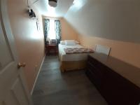 Atlantic Breeze Motel &amp; Apartments客房内的一张或多张床位