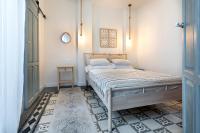 Apartamentos PROGRESO客房内的一张或多张床位