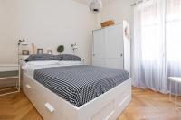 Apartamentos PROGRESO客房内的一张或多张床位