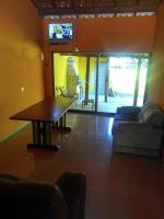 Casa de temporada Lindas Cachoeiras 10的电视和&#47;或娱乐中心