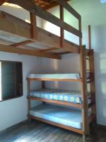Casa de temporada Lindas Cachoeiras 10客房内的一张或多张双层床