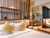 Grand Mercure Dubai City客房内的一张或多张床位