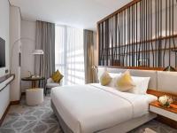 Grand Mercure Dubai City客房内的一张或多张床位